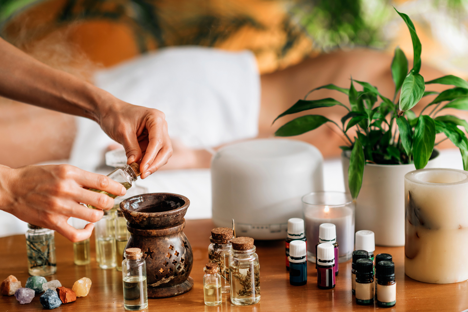 Ayurveda Aromatherapy Massage, Pouring Aromatic Oil in Essential Oil Diffuser
